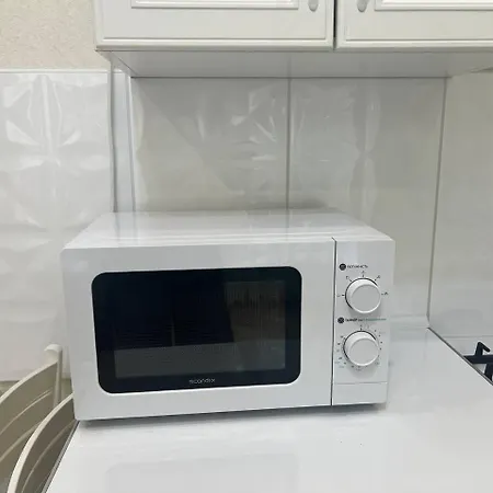 світла затишна в центрі біля оперного театру з балконом, який виходить у тихий львівський дворик * リヴィウ